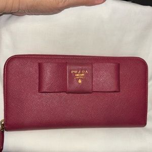 - Prada Pink Bow Saffiano Long Zip Wallet